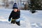 Little child in deep snow