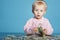 Little child with dollars on table