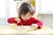 Little child eating scrambled eggs. Healthy nutrition