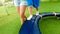 Little child feet walking on balancing board on the playground at park