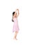 Little child girl dreams of becoming a ballerina. Beautiful little Asian children in pink tutu skirt isolated on white background