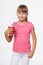 Little child girl holding a drink in disposable paper cup