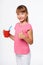 Little child girl holding a drink in disposable paper cup