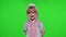 Little child girl smiling, showing thumbs up, ok gesture, agree sign in unicorn pajama on chroma key