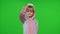 Little child girl smiling, showing thumbs up, ok gesture, agree sign in unicorn pajama on chroma key