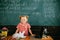 Little child have school lesson in mathematics. Cute girl do sums at mathematics on chalkboard. Math is for smart