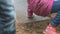 Little child moving down on a steel slide outdoors