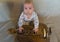 Little child with musical instrument hurdy-gurdy