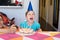 Little child with party cake screaming angry