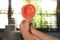 Little child with portable fan at home, closeup. Summer heat