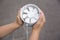 Little child with portable fan outdoors, closeup. Summer heat