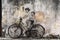 Little Children on a Bicycle street art mural by Lithuanian