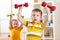 Little children boys exercising with dumbbells at home. Healthy life, sportive kids.