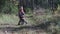 Little children, brother and sister play and frolic in the autumn forest