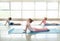 Little children practicing yoga indoors