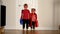 Little children wearing superheroes costumes run to camera