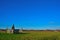 Little childs cabane on a green meadow