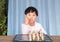 Little chinese girl learning chess