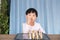 Little chinese girl learning chess