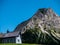 little christian church or chapel in mountain scenery, switzerland alps