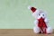 Little christmas themed toy with snowman, teddy bear, ball and red bells