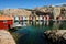 Little colorful boat houses at SmÃ¶gen at westcoast sweden