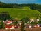 Little cozy german village between the green hills, vineyards in Black Forest