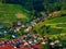 Little cozy german village between the green hills, vineyards in Black Forest