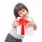 Little cute asian girl with gift box