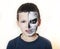 Little cute boy with face paint like skeleton to celebrate halloween, lifestyle people concept