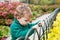 Little cute boy in the park. Close up picture of Lovelyl ittle boy in the autumn garden. Outdoor activities for children