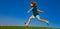 Little cute boy running on grass. Kids exploring nature, summer. Active healthy outdoor sport. Fun activity. Spring and