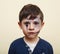 little cute child with facepaint on birthday party, zombie Apocalypse facepainting, halloween preparing concept