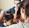 little cute child making facepaint on birthday party, zombie Apocalypse facepainting, halloween preparing concept