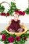 Little cute girl 1 year old in a dress of Marsala color with a wicker basket with peonies. Spring and flowers.