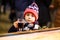 Little cute kid boy with cup of steaming hot chocolate or children punch. Happy child on Christmas market in Germany