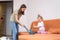 little daughter cleaning in the house, child dusting, Cute little helper girl washing floor with mop, happy family