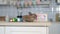 Little Easter Rabbit Sitting on Table in Kitchen