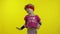 Little energetic caucasian girl in pink sportswear making fit dance, modern aerobic dancer