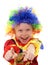 Little excited girl in a clown costume