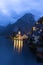 Little famous Hallstatt village in Alps at dusk in Austria