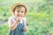 Little farmer child - lovely girl with picked vegetables