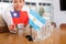 Little flag of Argentina on table and flag of Taiwan put next to it by young woman