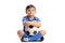 Little footballer sitting on the floor