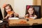 Little friends eating pizza