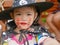 Little girl, 3 years old, is happy with her Halloween makeup and pretend playing as a powerful witch