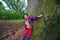 Little girl and ancient camphor tree-Cinnamomum camphora