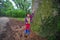 Little girl and ancient camphor tree-Cinnamomum camphora