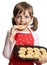 Little girl baking Christmas cookies