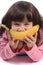 Little girl with banana smile